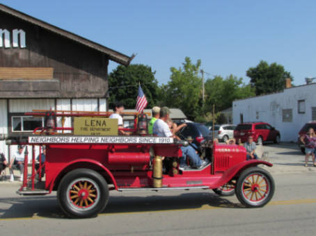 Lena Fire Vehicle Driving Through Town